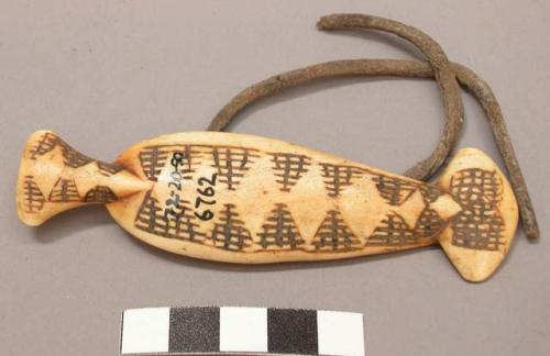 Ornament made of bone, worn on the arm