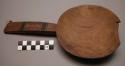 Wooden spoon for removing food from pot. Chikowe