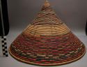 Basketry food cover, woven veg. fiber, conical, red/bowrn/buff  geo. deco