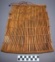 Small marsh grass basket made by the men of the tonga fishing people