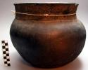 Black pottery vessel.  Mkati