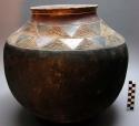 Large pottery vessel with incised designs. Nsuku