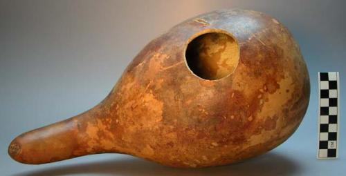 Gourd vessel with opening on side. Luwoko