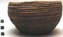 Bowl-shaped basket, coiled weave, reddish-brown fibre, mbombo