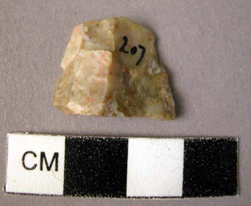 Broken chert flake showing signs of use; rectangular shape; one corner elongated