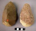 2 well worked quartzite pebble-butted hand axes