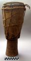 Carved wooden drum - female