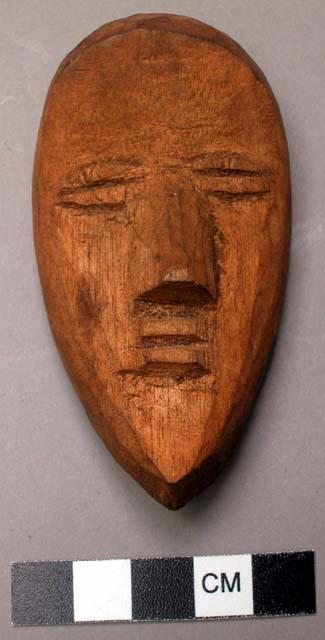 Small wooden mask.