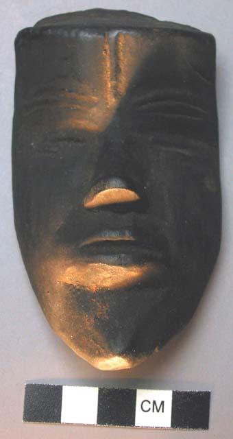 Small wooden mask