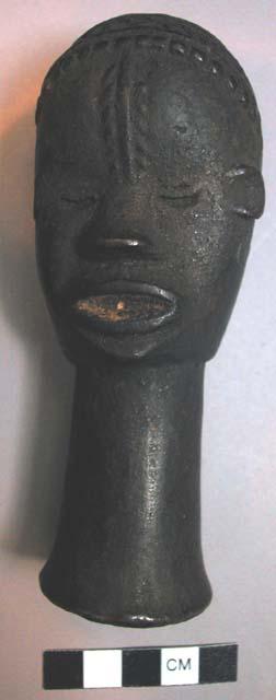 Small carved wooden head, towolo's hand piece