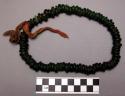 Bead necklace of dark green old beads