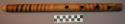 Bamboo flute with pyrographic designs and four holes. Lilongwe