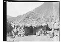 Stone house with small rooms of cane added in front