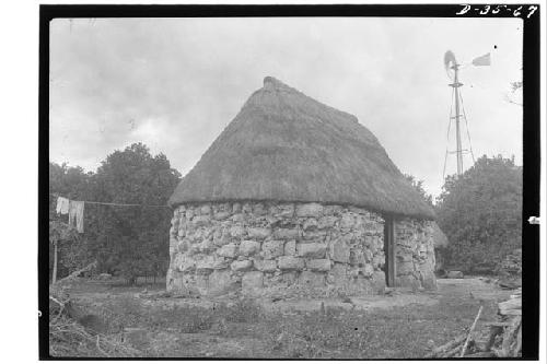 Stone Walls; Grass Thatch with Crest as in Yucatecan Frescos