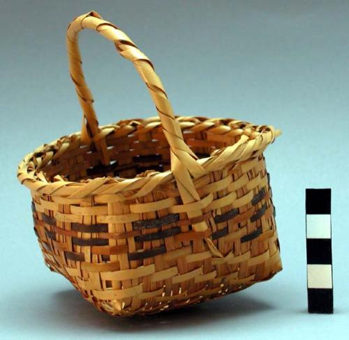 Hand basket of cane