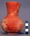 Red pottery carafe