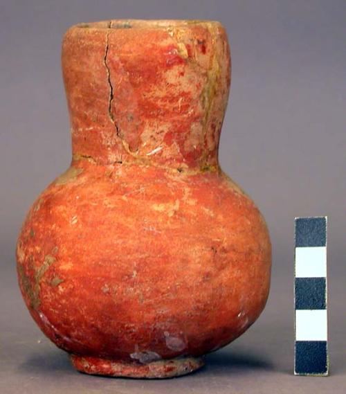 Red pottery carafe, neck broken