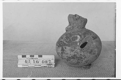 Small Pottery Jar with Animal Face on Side of Neck