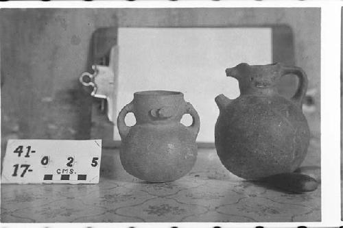 Two Small Brown Ware Jars; Applique Faces