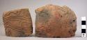 Two fragments of incised pottery from bowl