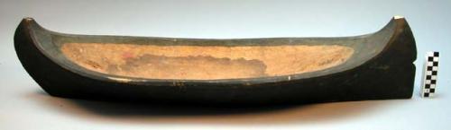 Wooden model of dugout canoe