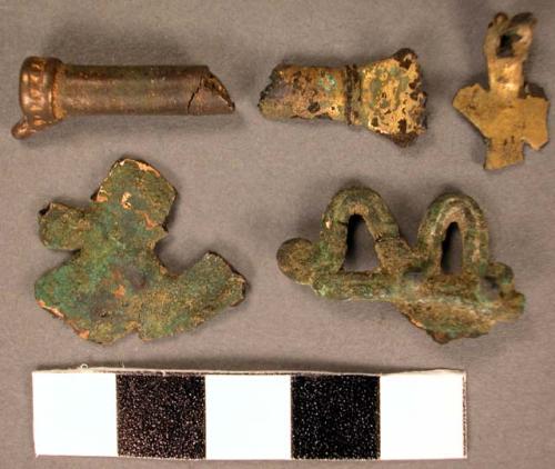 Fragments of metal pendants