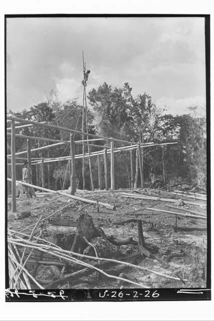 Joe climbing mast