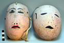 2 Painted masks made from gourds - worn on St. Sebastian's Day
