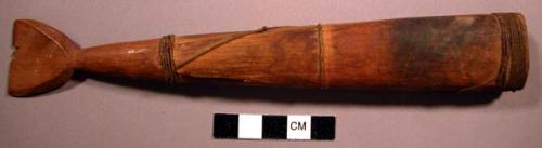 Wooden knife sheath, in shape of whale or seal