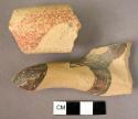 2 pottery handle fragments - Mycenaean, paint blotched