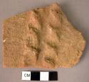 Potsherd - coarse fragment with plastic bands and rope pattern indentation