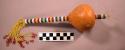 Small gourd rattle - handle beaded in rings of pink, white, blue, yellow&red