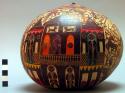 Elaborately carved and painted gourd - approx. 7" diam.