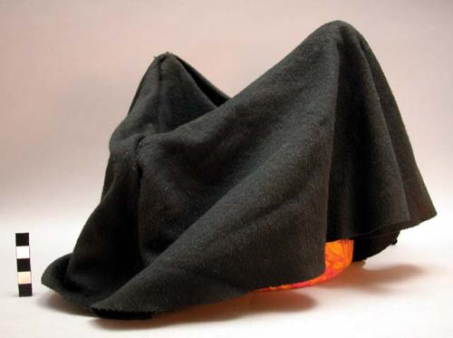 Hat, fiber core covered w/ brocade, draped with black wool, cotton lining