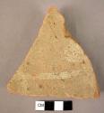 Potsherd - light on greenish slip.