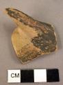 Poorly glazed pottery handle fragment