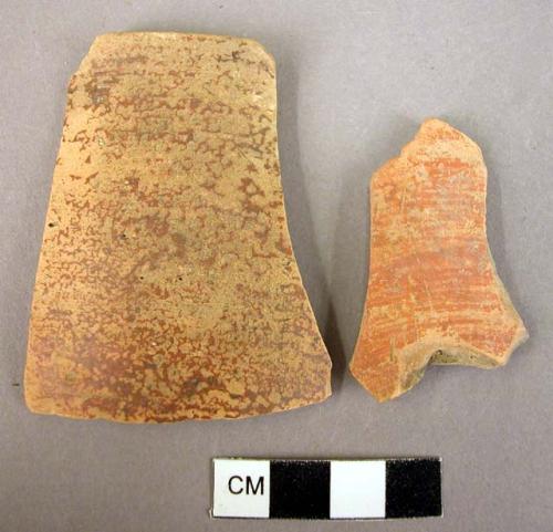 Rim sherd and sherd of pottery cup