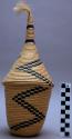 Contemporary basket with conical lid, natural raffia with a black zig-zag design