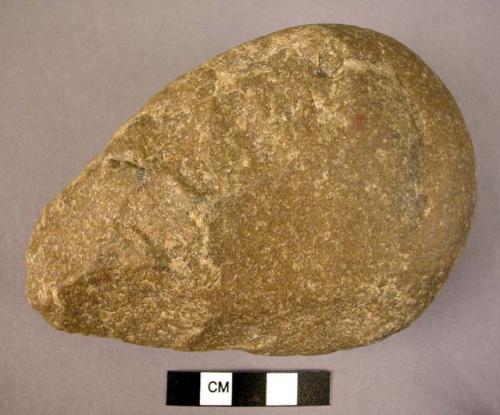 Ovate quartzite hand axe made on a pebble; cortex at butt end