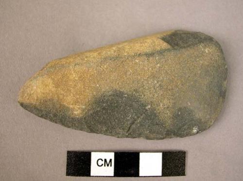 Celt (trap); pointed butt; slightly patinated cortex on  both surface; chipped