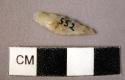 Backed chalcedony blade; crescentic-shape; pointed worked back; slender