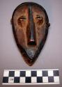 Wooden mask - brown patine (6" high)