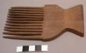 Wooden hair comb