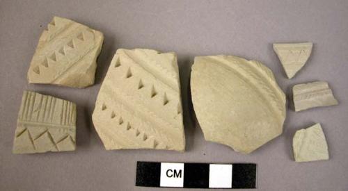 Ceramic rim and body sherds, fine thin grey ware, impressed and incised