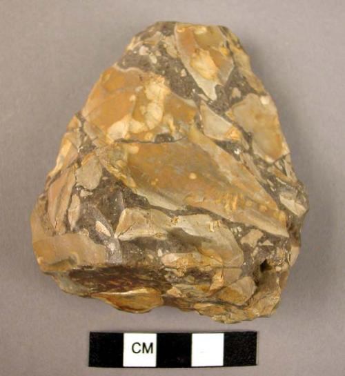 Chipped stone biface, handaxe, triangular, thick butted, rounded blunt tip