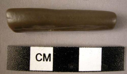 Small fine-grained stone rod with trepezoidal section - smoother or polisher