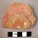 Body sherd, reddish ext. ornage int. meduim paste, grit temper and some shell, e