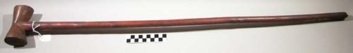 Wood scepter - horizontal hour-glass shaped end.