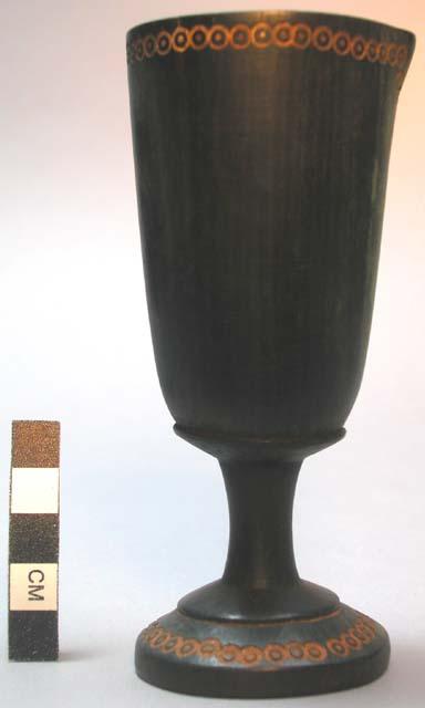 Stemmed lip goblet of native wood