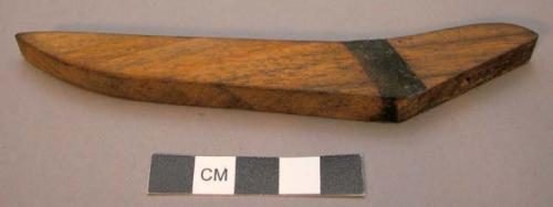 Wood fragment, carved leg or support?  black pigment at bend